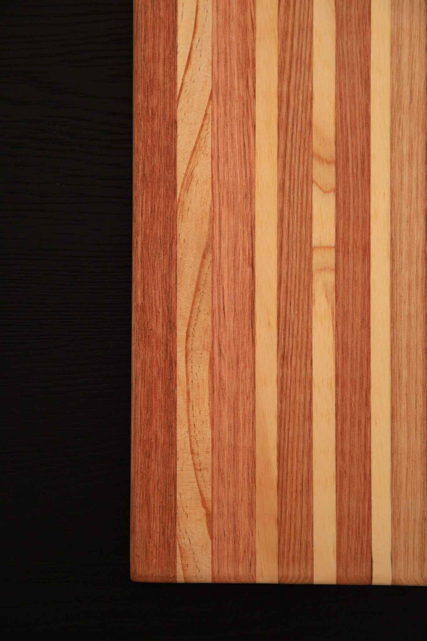 Close-up of The Entertainer Board highlighting the unique Tasmanian Oak grain and natural character of the timber.