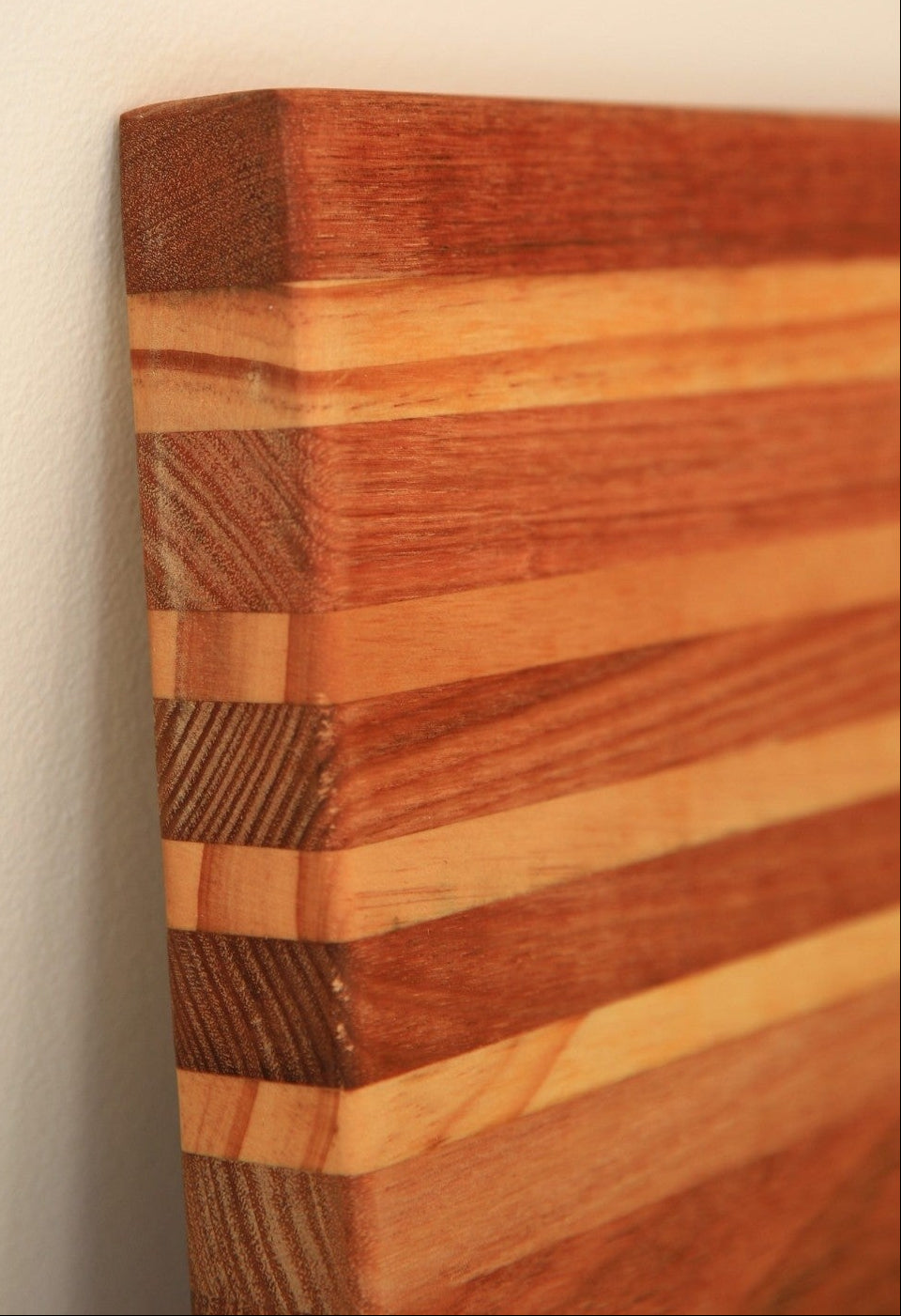 Close-up of the rounded edge and handcrafted construction of The Entertainer Board made from premium Tasmanian Oak.