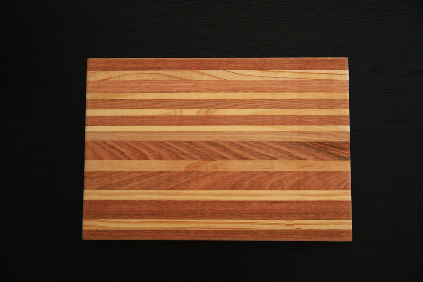 The Entertainer Board handcrafted from premium Tasmanian Oak shown from above, highlighting the natural timber grain and generous serving surface.