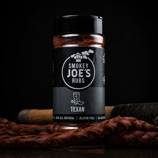 Smokey Joe's Texan BBQ seasoning in a 180 g shaker with black label on a black studio background.
